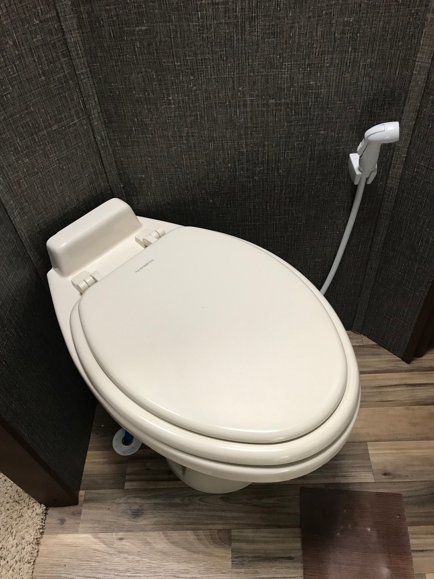 new elongated Dometic 320 toilet with bowl rinser
